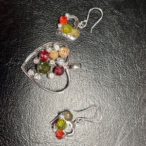 Ruby, Emerald and Brown and White Sapphires.